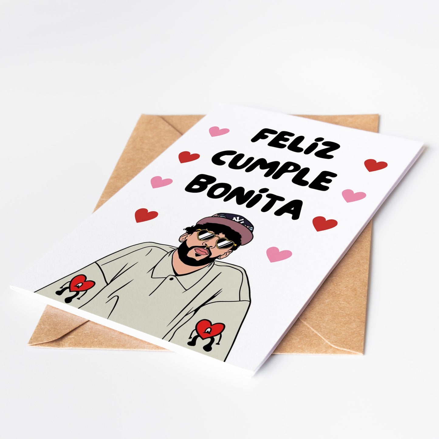 Express your love in a unique way with our Bad Bunny Love Card. Featuring a cute illustration of Bad Bunny and the phrase "Feliz Cumple Bonita," this card is the perfect way to show your loved one how much they mean to you.