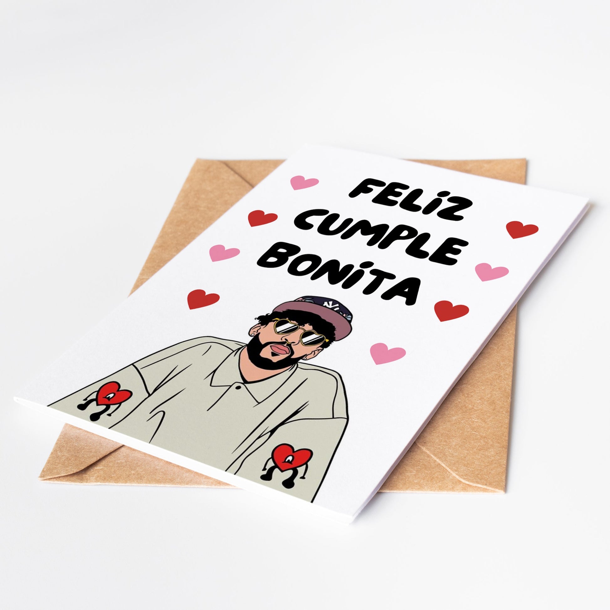 Express your love in a unique way with our Bad Bunny Love Card. Featuring a cute illustration of Bad Bunny and the phrase "Feliz Cumple Bonita," this card is the perfect way to show your loved one how much they mean to you.