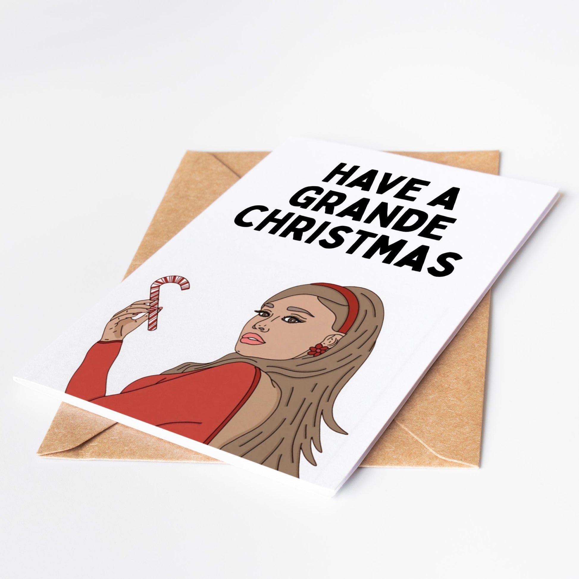 Celebrate the holidays with our exclusive Ariana Grande Christmas Card! This festive greeting card features the pop sensation in a stylish holiday-themed design that's perfect for Arianators and music lovers.