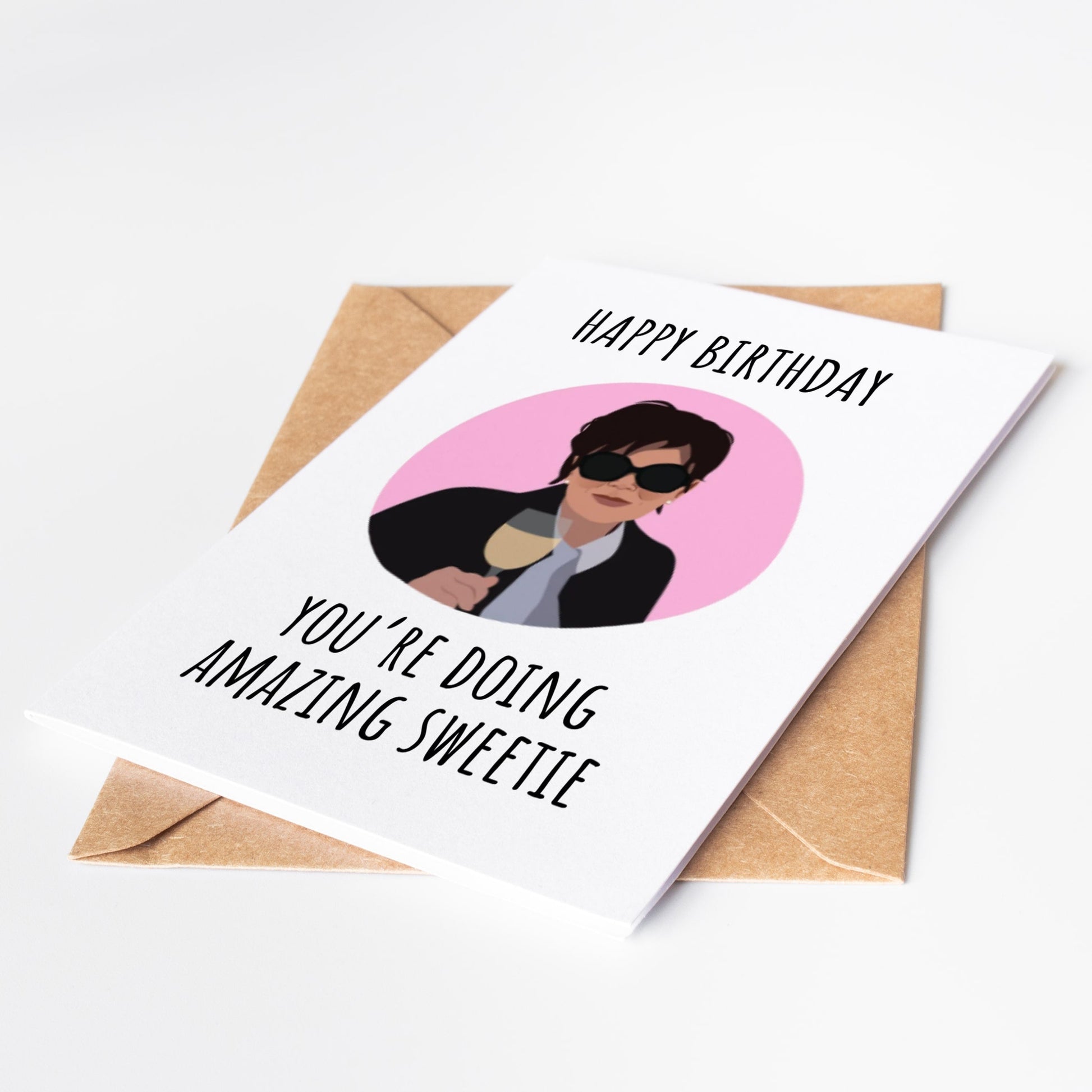 Surprise your loved ones with the Kris Jenner Birthday Card. Featuring her iconic catchphrase, "You're doing amazing sweetie," this card is perfect for any fan or fashionista. Show your appreciation and bring a smile to their face with this fun and unique card!