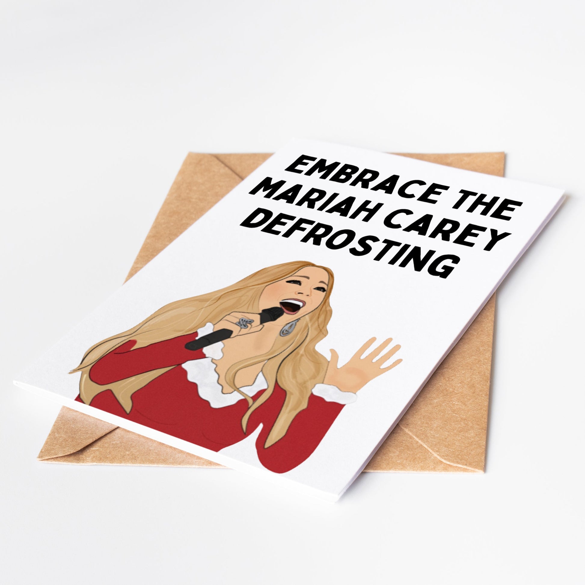 Celebrate the holidays with our exclusive Mariah Carey Christmas Card! This festive greeting card captures the magic of the season with the iconic Queen of Christmas herself.