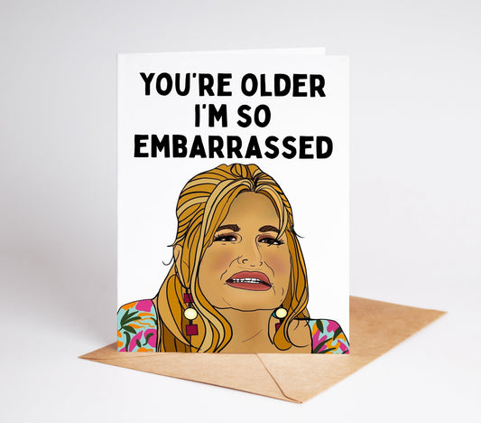 Celebrate another year of life with the Tanya Mcquoid White Lotus Birthday Card! This beautiful card features a hand drawn white lotus design and a humorous message that will bring a smile to anyone's face. 