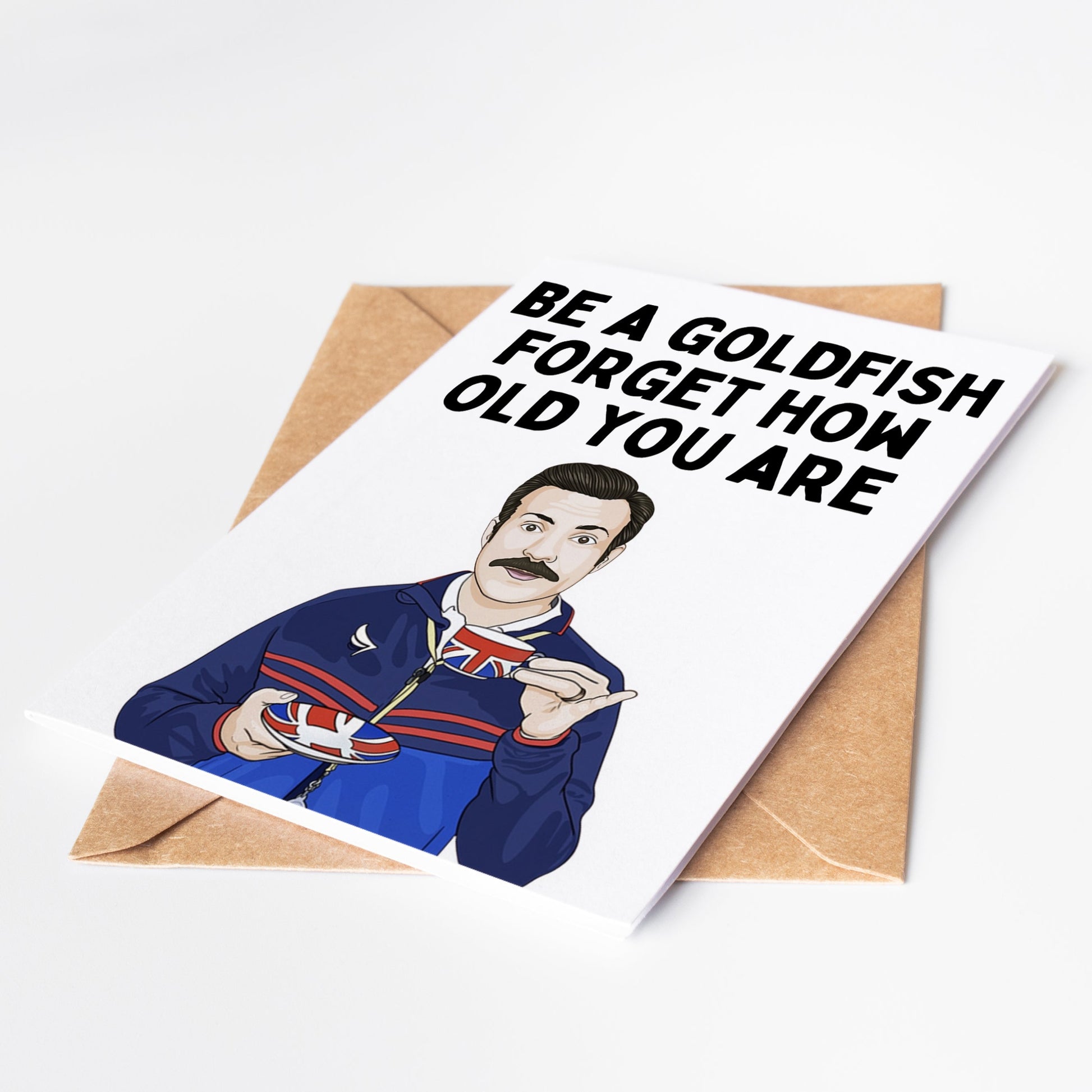 Celebrate any birthday with the Ted Lasso Birthday Card, featuring your favorite optimistic Coach Ted Lasso! Perfect for fans of the show, this card will bring a smile to anyone's face. Share the love and positivity with this one-of-a-kind card.