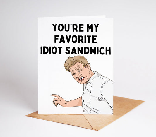 Send a hilarious and heartwarming message with the Gordon Ramsay Idiot Sandwich Greeting Card! Featuring the iconic phrase from the famous chef, this card is perfect for any occasion. Show your love and humor with this unique and memorable card.