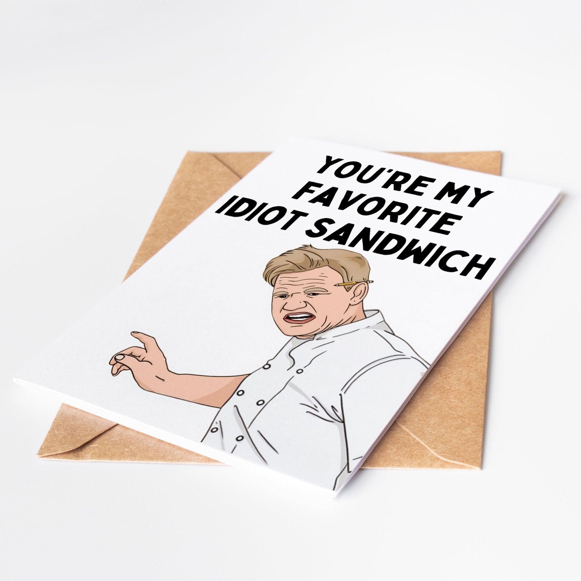 Send a hilarious and heartwarming message with the Gordon Ramsay Idiot Sandwich Greeting Card! Featuring the iconic phrase from the famous chef, this card is perfect for any occasion. Show your love and humor with this unique and memorable card.