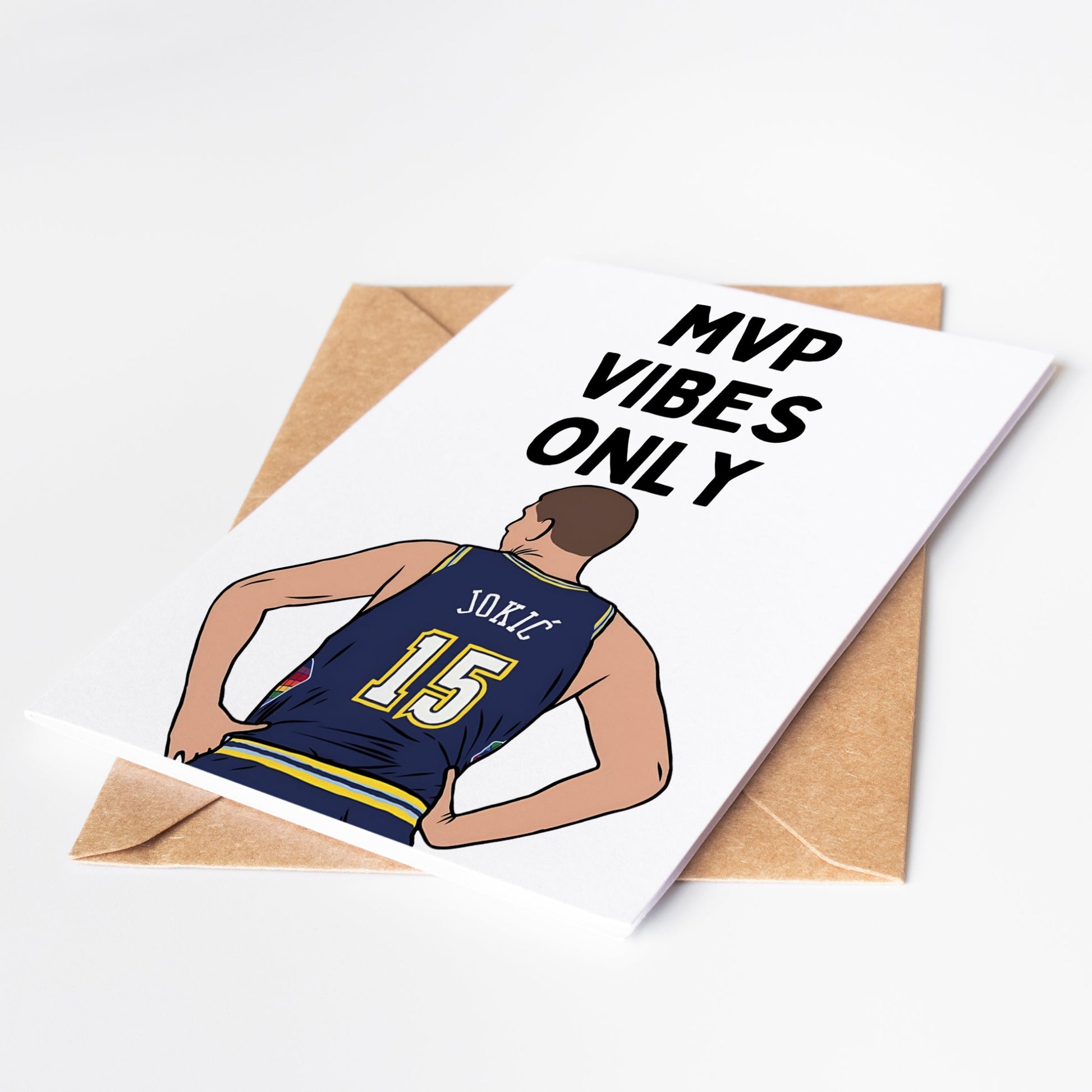 Celebrate a basketball fan's special day with the Nikola Jokic NBA Greeting Card! Featuring the talented NBA player, this card is perfect for birthdays, graduations, and any event. Share the love for the game and bring a smile to their face with this unique and inspiring card.