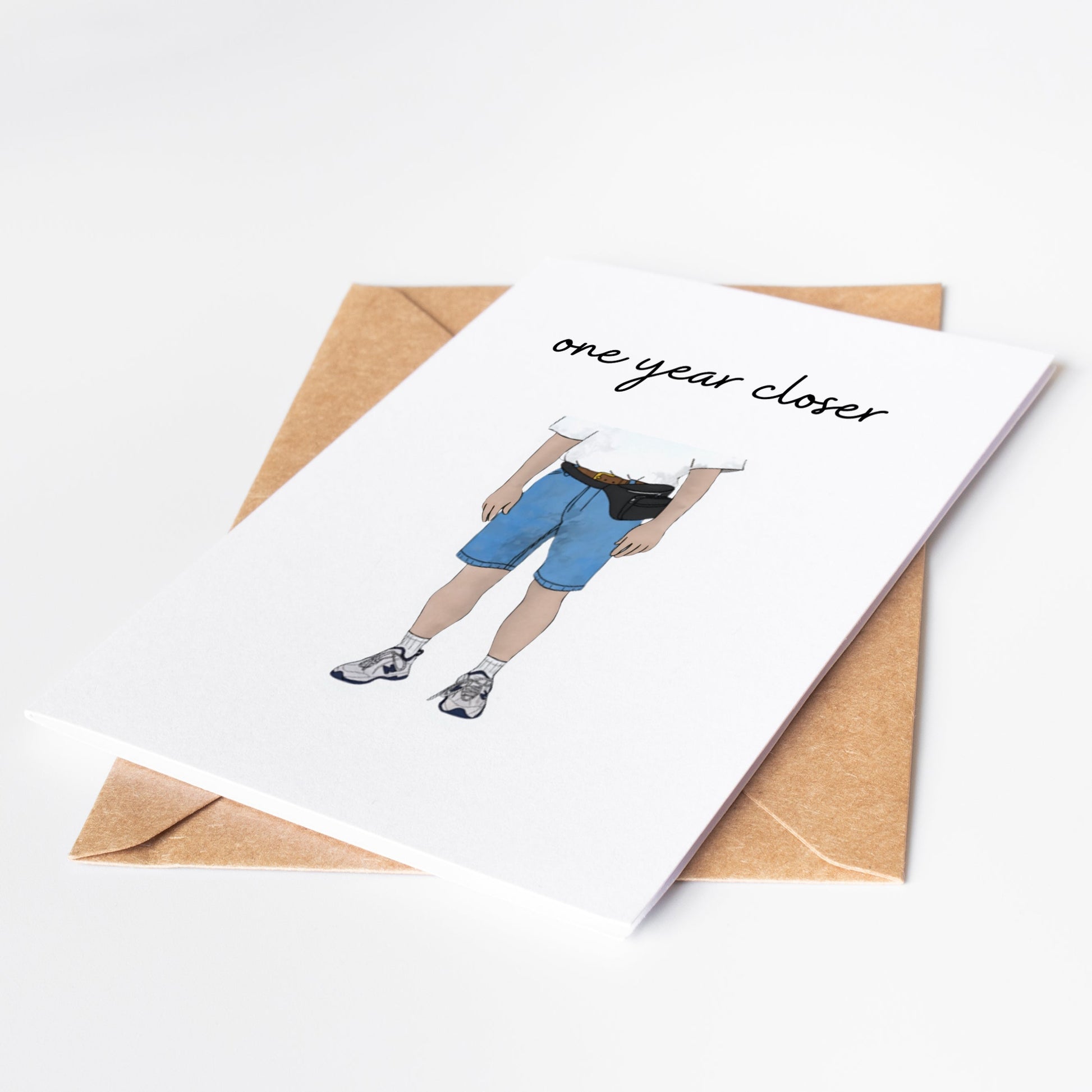 Celebrate another year of dad style with our One Year Closer Funny Birthday Card! As your dad becomes one year closer to the ultimate dad look, complete with dad shoes and fanny packs, this card is the perfect way to add some humor to their special day.&nbsp;