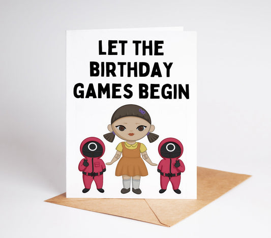 Celebrate your loved one's birthday with our Squid Games Birthday Card! This unique and exciting card features designs inspired by the hit show, perfect for fans of all ages. Make their day even more special with this one-of-a-kind card that will surely bring a smile to their face.