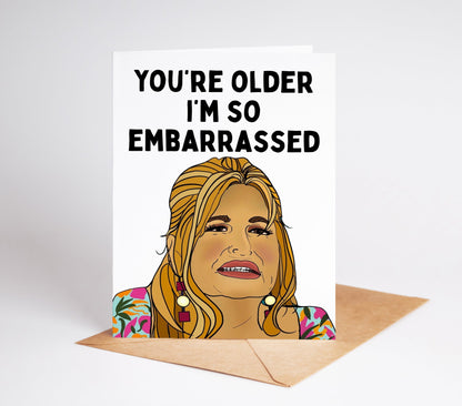 Celebrate another year of life with the Tanya Mcquoid White Lotus Birthday Card! This beautiful card features a hand drawn white lotus design and a humorous message that will bring a smile to anyone's face.&nbsp;