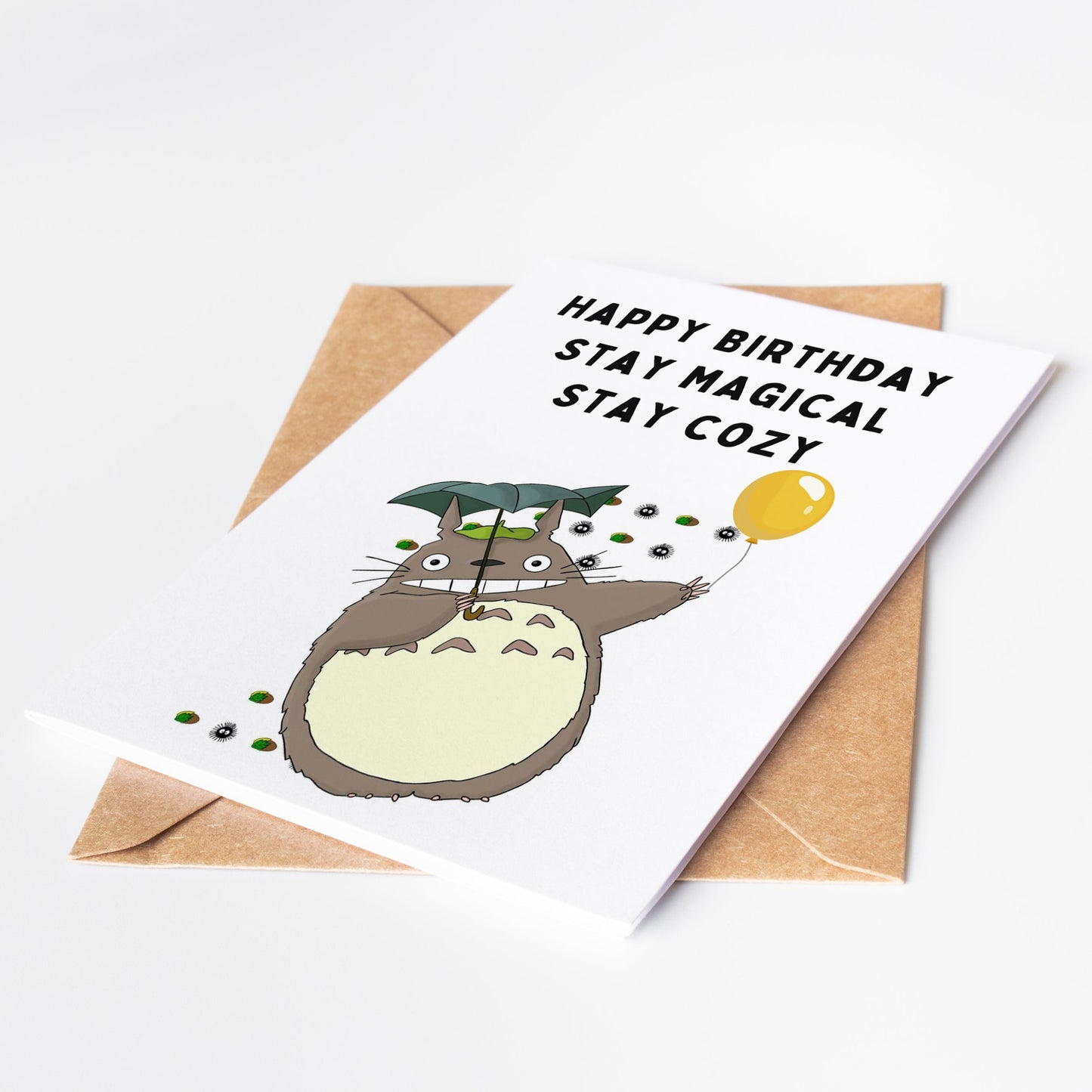 Celebrate with your friends and family in a heartwarming and magical way with our My Neighbor Totoro Birthday Card! Featuring the beloved characters from the iconic Studio Ghibli film, this card is perfect for fans of all ages.